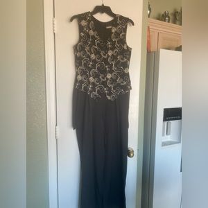 Black and cream jump suit.